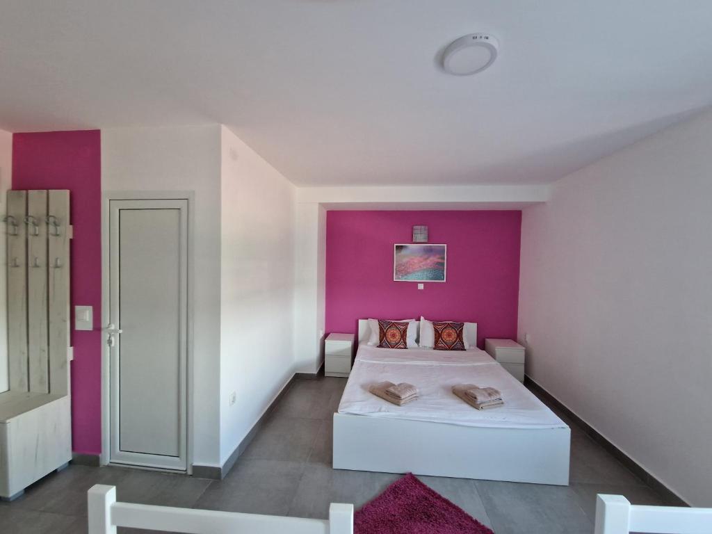 Postel nebo postele na pokoji v ubytování Flamingo Resort