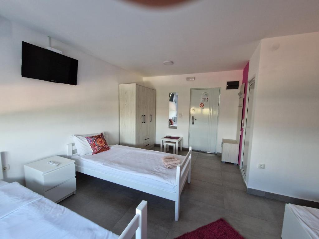 Postel nebo postele na pokoji v ubytování Flamingo Resort