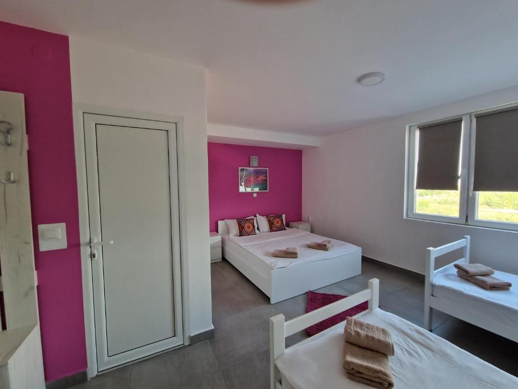 Postel nebo postele na pokoji v ubytování Flamingo Resort