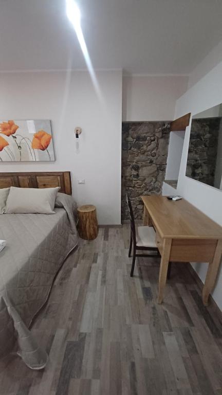 Posteľ alebo postele v izbe v ubytovaní B&B Le Vie del Borgo