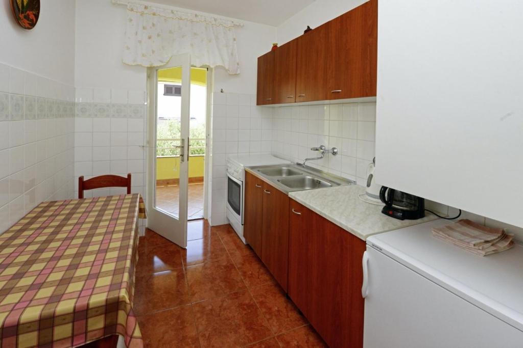 Kuchyň nebo kuchyňský kout v ubytování Krebel in Poreč - Istrien
