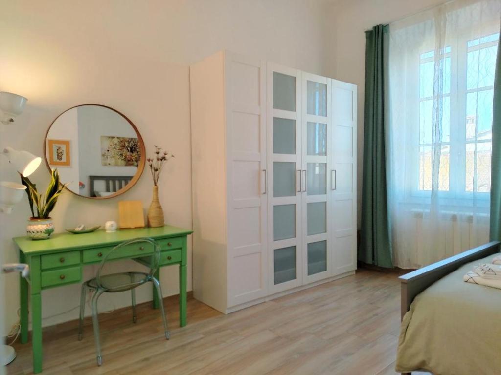 Llit o llits en una habitació de Casa Sansevera Lucca