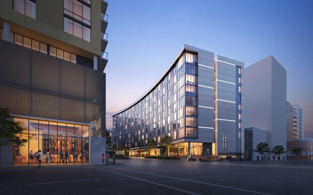 a rendering of a building in a city at Embassy Suites By Hilton Madison Downtown in Madison
