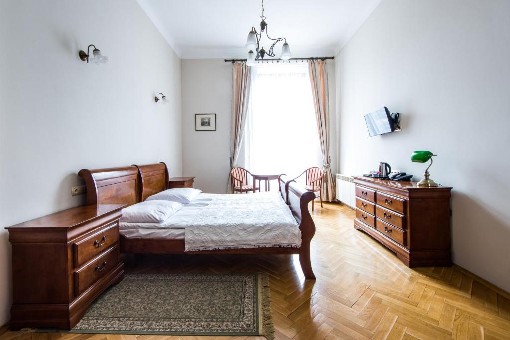 Posteľ alebo postele v izbe v ubytovaní Aparthotel Basztowa