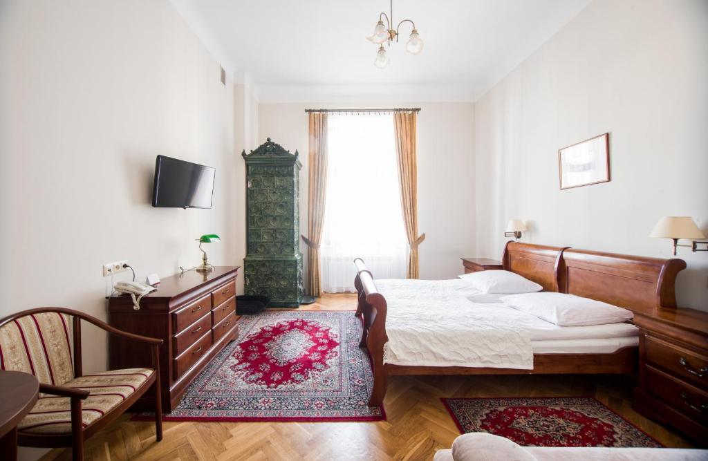 Posteľ alebo postele v izbe v ubytovaní Aparthotel Basztowa