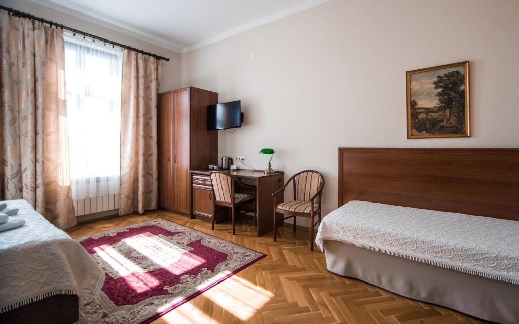 Posteľ alebo postele v izbe v ubytovaní Aparthotel Basztowa