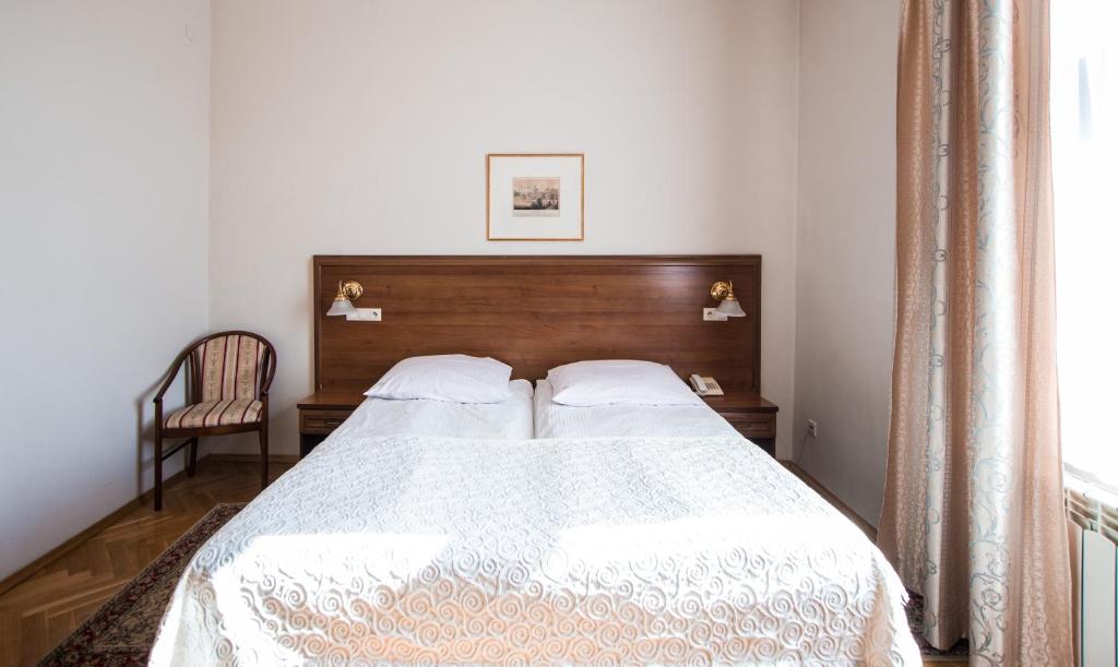 Posteľ alebo postele v izbe v ubytovaní Aparthotel Basztowa