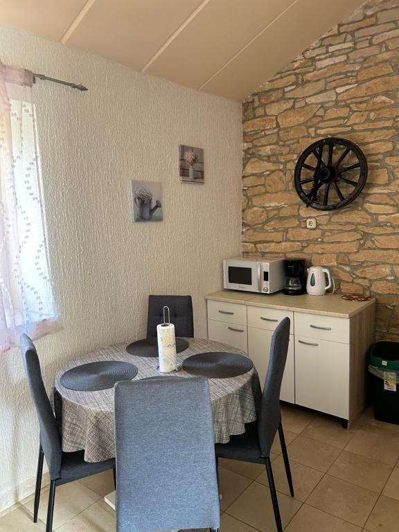 Kuchyň nebo kuchyňský kout v ubytování Apartman Luka