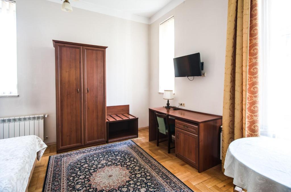 Posteľ alebo postele v izbe v ubytovaní Aparthotel Basztowa