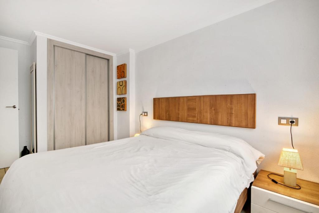 Postel nebo postele na pokoji v ubytování Apartamento Luisa