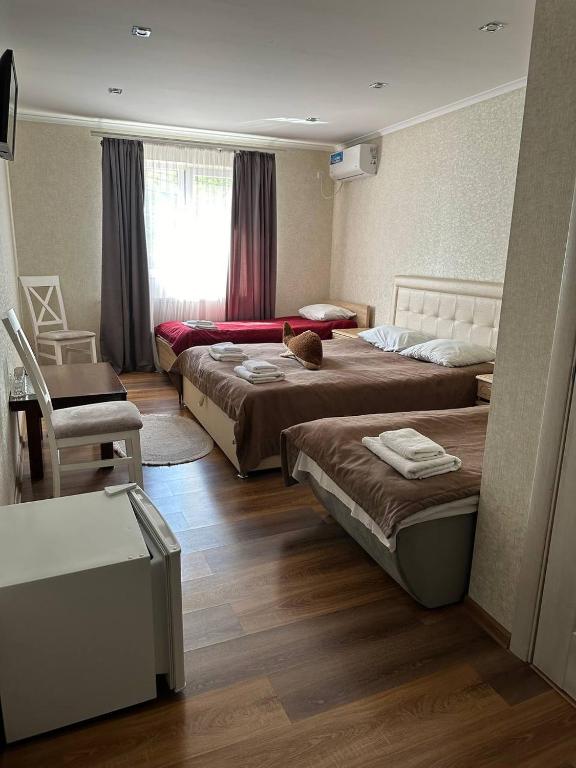Postel nebo postele na pokoji v ubytování Готель-спа "Еліт"