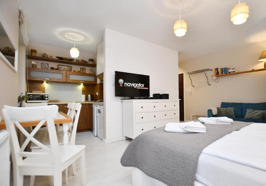 Posteľ alebo postele v izbe v ubytovaní Apartamenty NAVIGATOR-PORT