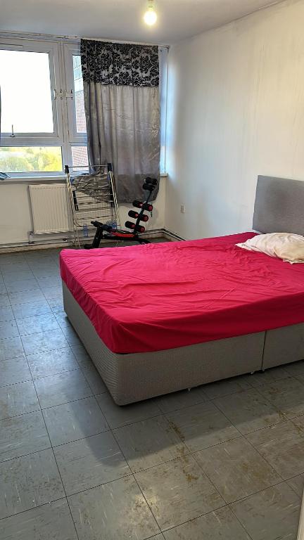 Ένα ή περισσότερα κρεβάτια σε δωμάτιο στο Sheringham Tower