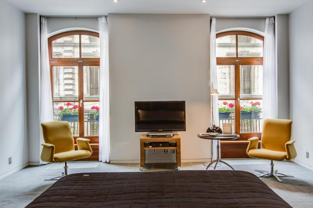 TV a/nebo společenská místnost v ubytování Hotel Gault