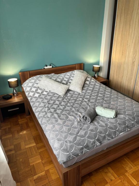 Posteľ alebo postele v izbe v ubytovaní Apartament 18