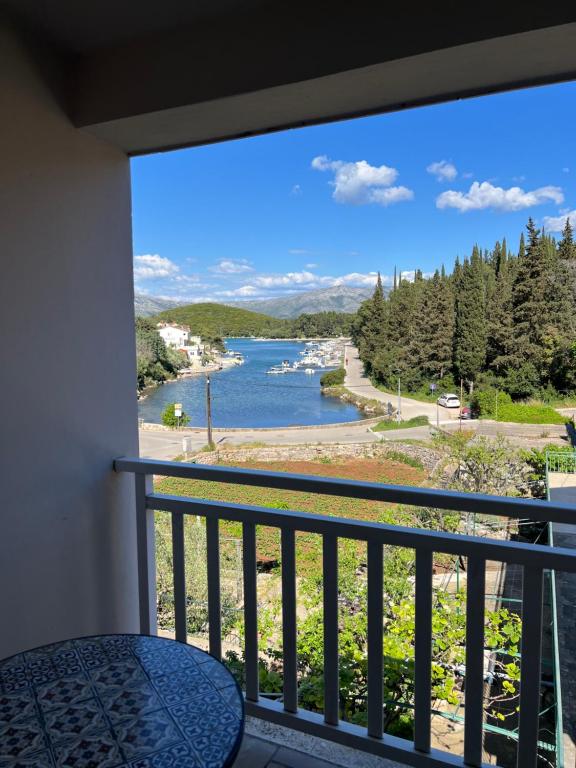a view of a river from a balcony at Apartman Kalac in Korčula