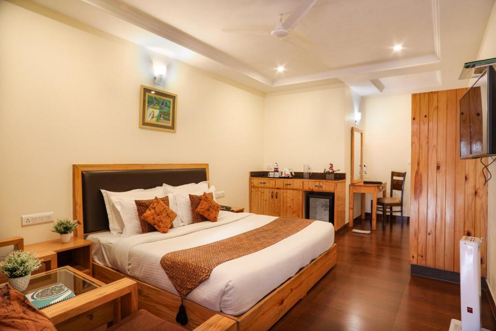 Postel nebo postele na pokoji v ubytování Hotel SunGrace