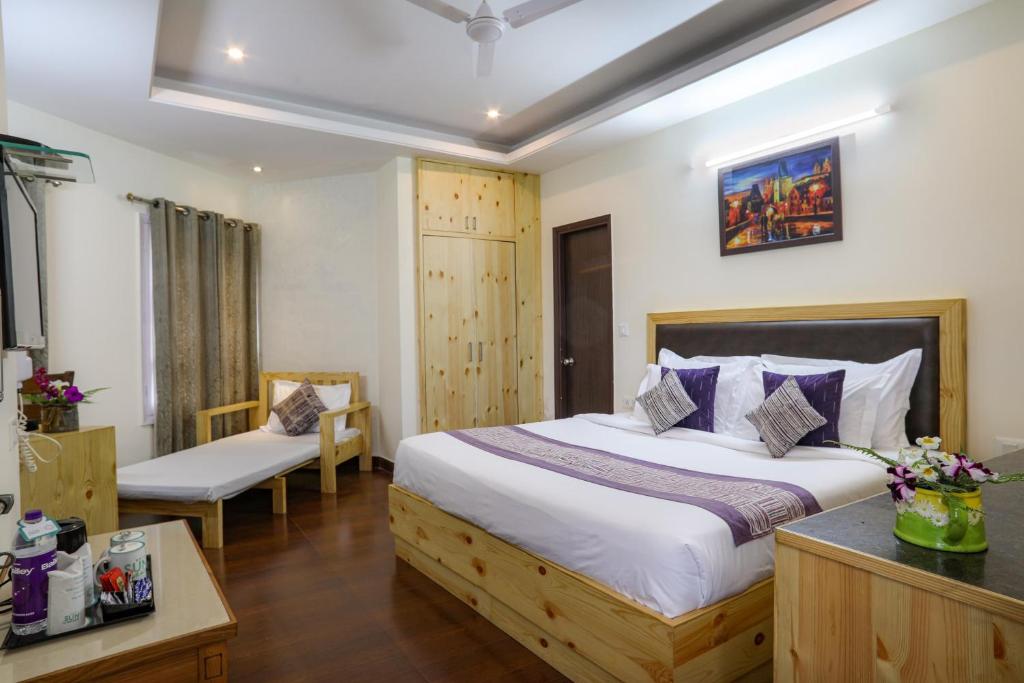 Postel nebo postele na pokoji v ubytování Hotel SunGrace