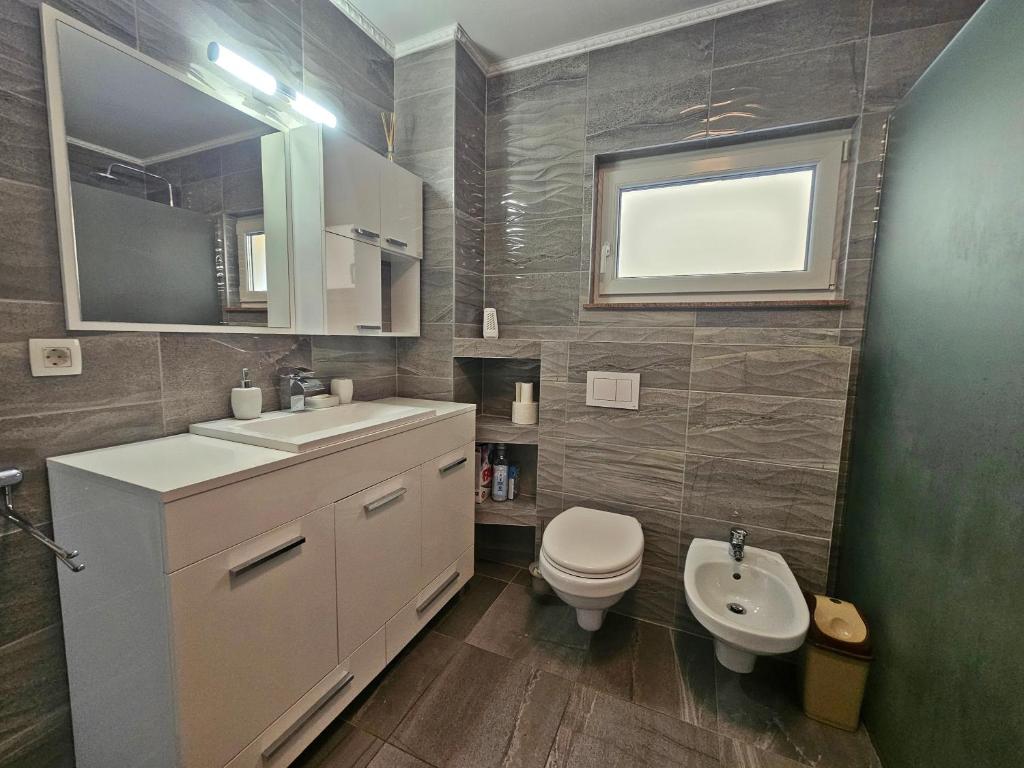 Kúpeľňa v ubytovaní Podstrana Holiday