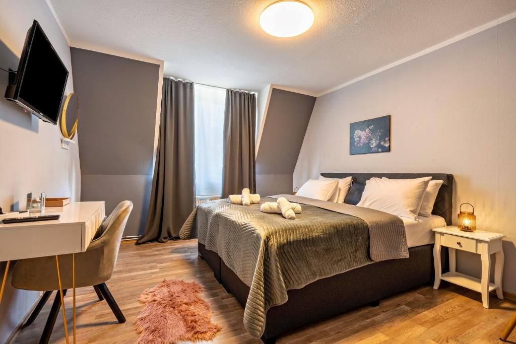 Ένα ή περισσότερα κρεβάτια σε δωμάτιο στο Appartmenthaus - Wohnung F