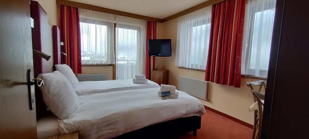 Postel nebo postele na pokoji v ubytování Hotel Buckelhof
