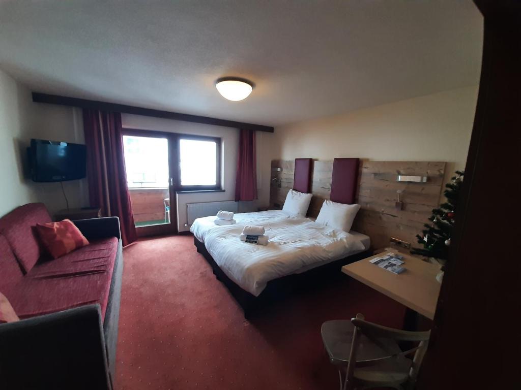 Postel nebo postele na pokoji v ubytování Hotel Buckelhof