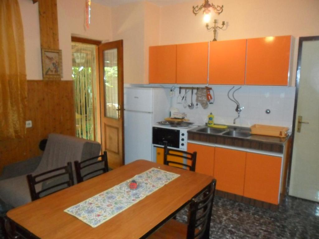 Kuchyň nebo kuchyňský kout v ubytování Apartmani Yucca