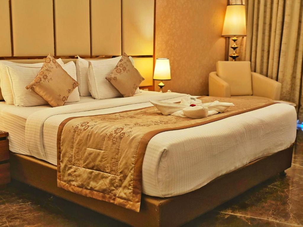 Postel nebo postele na pokoji v ubytování UVA Meridian Bay Resort & Spa