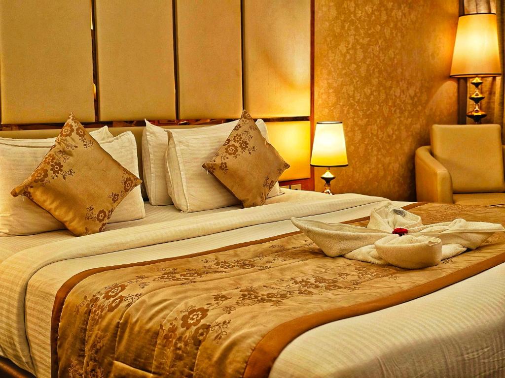 Postel nebo postele na pokoji v ubytování UVA Meridian Bay Resort & Spa