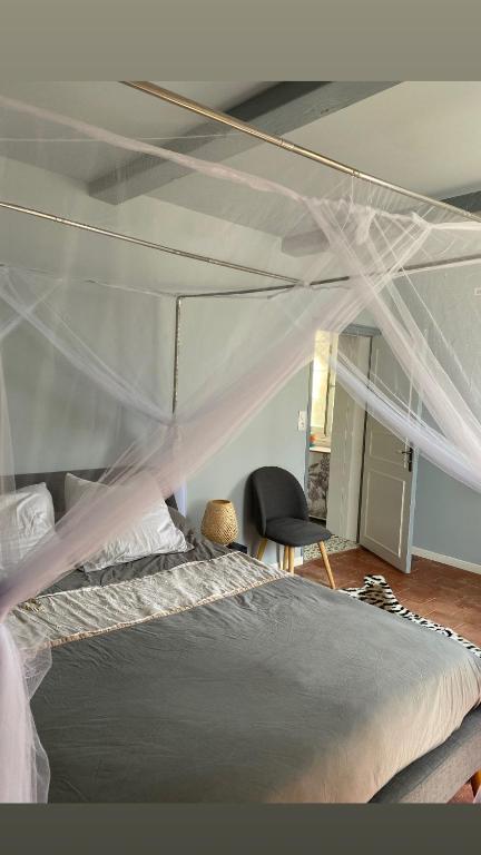 Postel nebo postele na pokoji v ubytování La Bastide