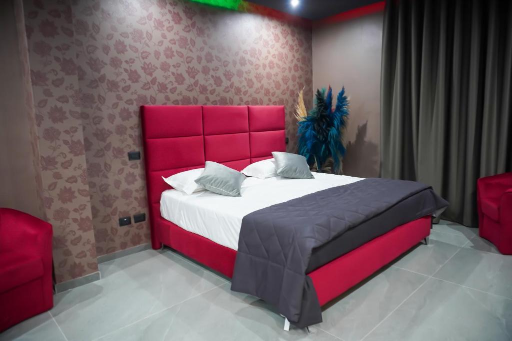 Postel nebo postele na pokoji v ubytování Hotel El Pamas