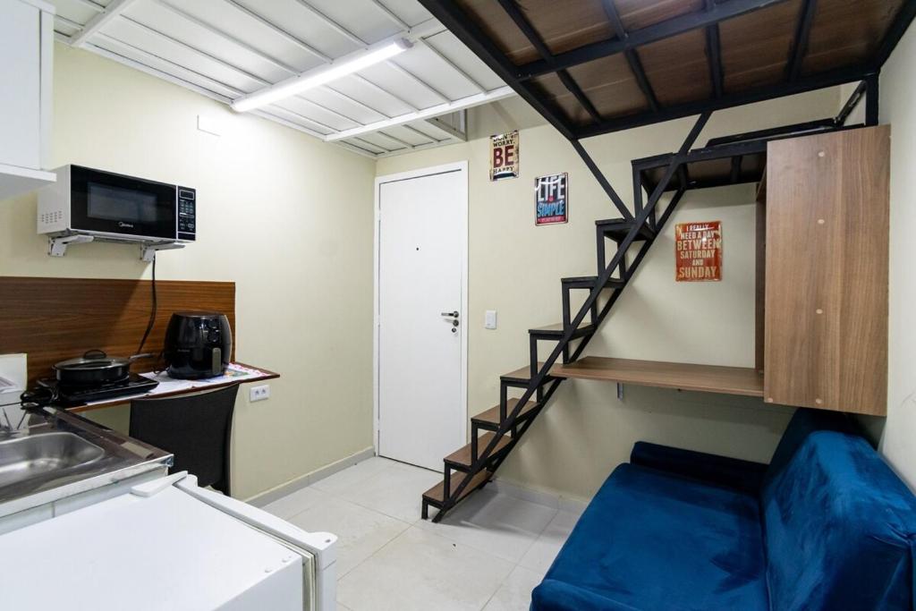 Pokój z łóżkiem piętrowym w pokoju w obiekcie 38 LOFT DUPLO · LOFT perto da São PauloExpo /Aeroporto Congonhas w São Paulo