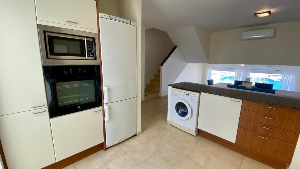 Kuchyňa alebo kuchynka v ubytovaní RMP 32 Residencial Marina del Port