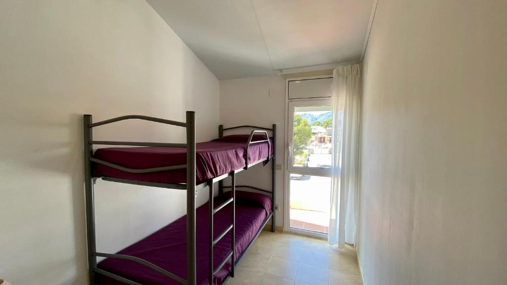 Posteľ alebo postele v izbe v ubytovaní RMP 32 Residencial Marina del Port