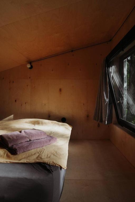 Postel nebo postele na pokoji v ubytování Chateau Chapiteau