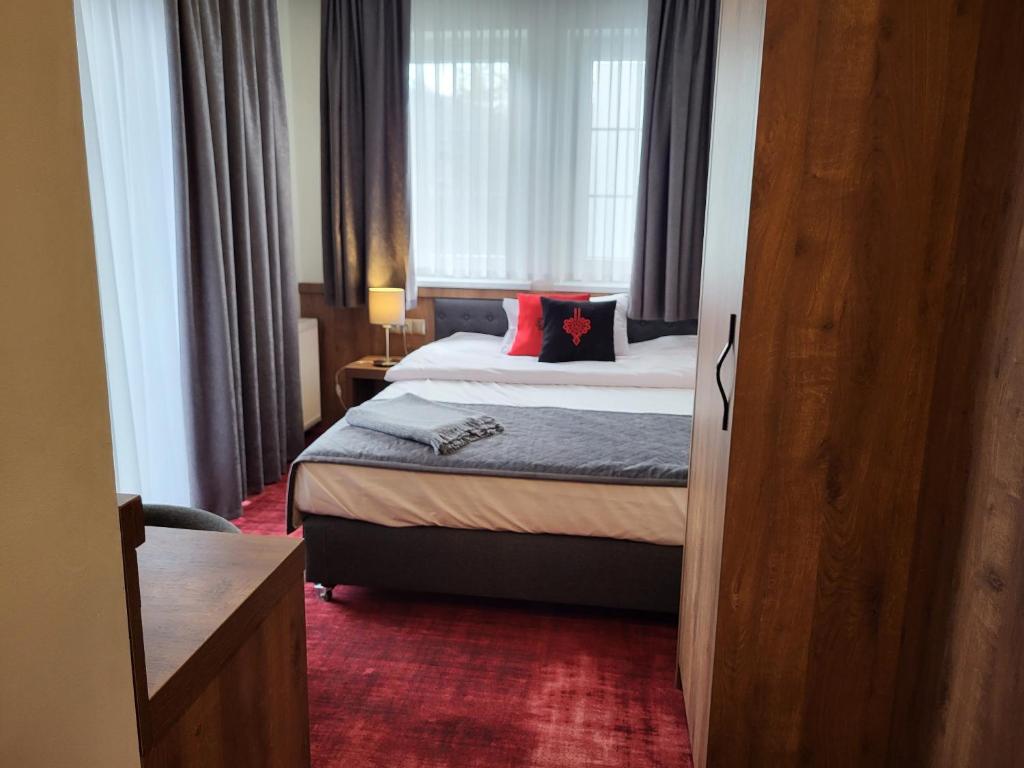 Postel nebo postele na pokoji v ubytování Magnolia