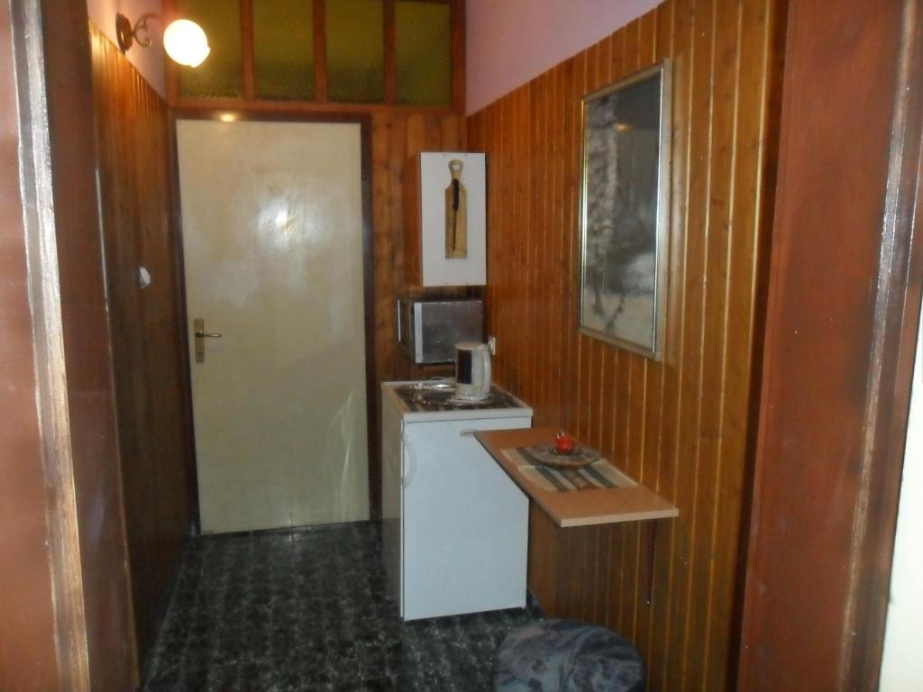 Kuchyň nebo kuchyňský kout v ubytování Apartmani Yucca