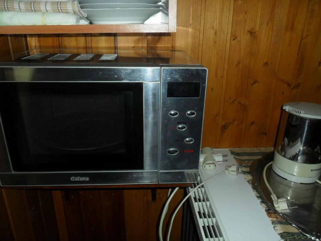 Kuchyň nebo kuchyňský kout v ubytování Apartmani Yucca