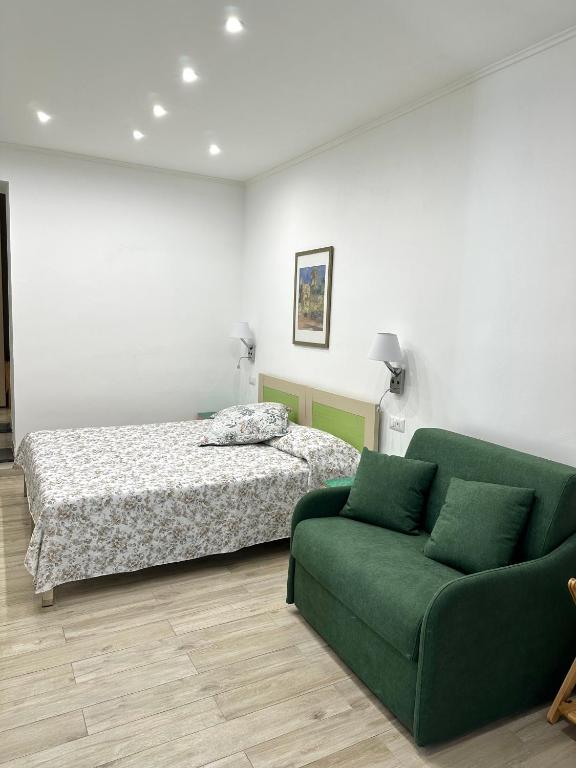 Postel nebo postele na pokoji v ubytování Hedera Capri B&B