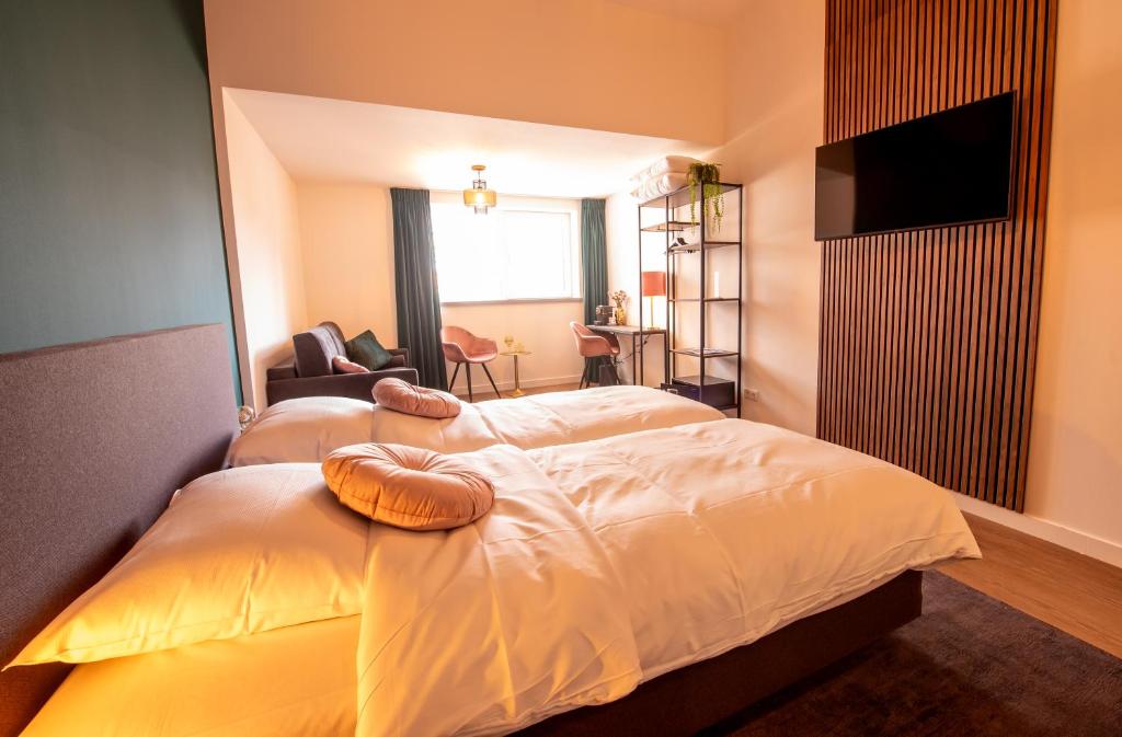 Postel nebo postele na pokoji v ubytování Hotel Bom