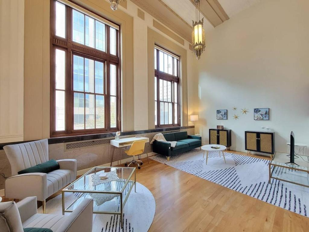 a living room with a couch and a table at City Council Chambers in Rochester