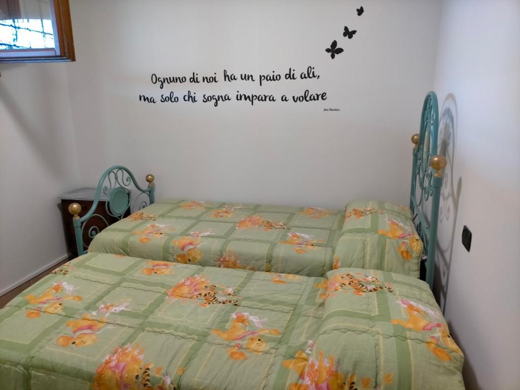 Postel nebo postele na pokoji v ubytování CASA ELGA