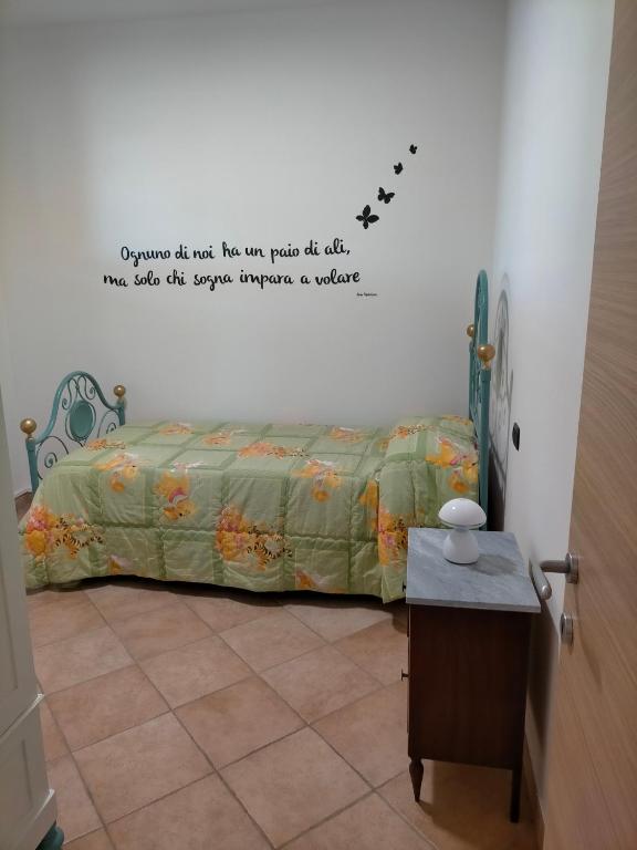 Postel nebo postele na pokoji v ubytování CASA ELGA