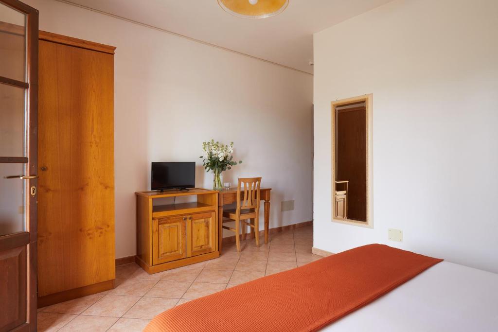 TV a/nebo společenská místnost v ubytování Hotel Fattoria Belvedere