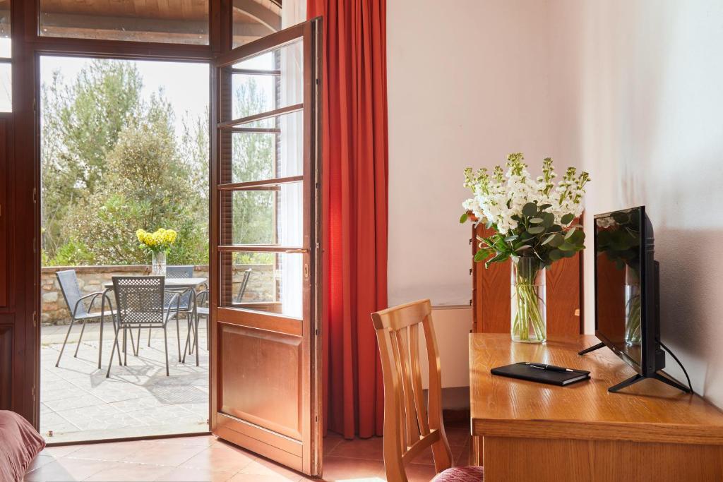 TV a/nebo společenská místnost v ubytování Hotel Fattoria Belvedere