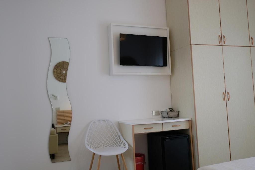 TV a/nebo společenská místnost v ubytování Hotel Solemare