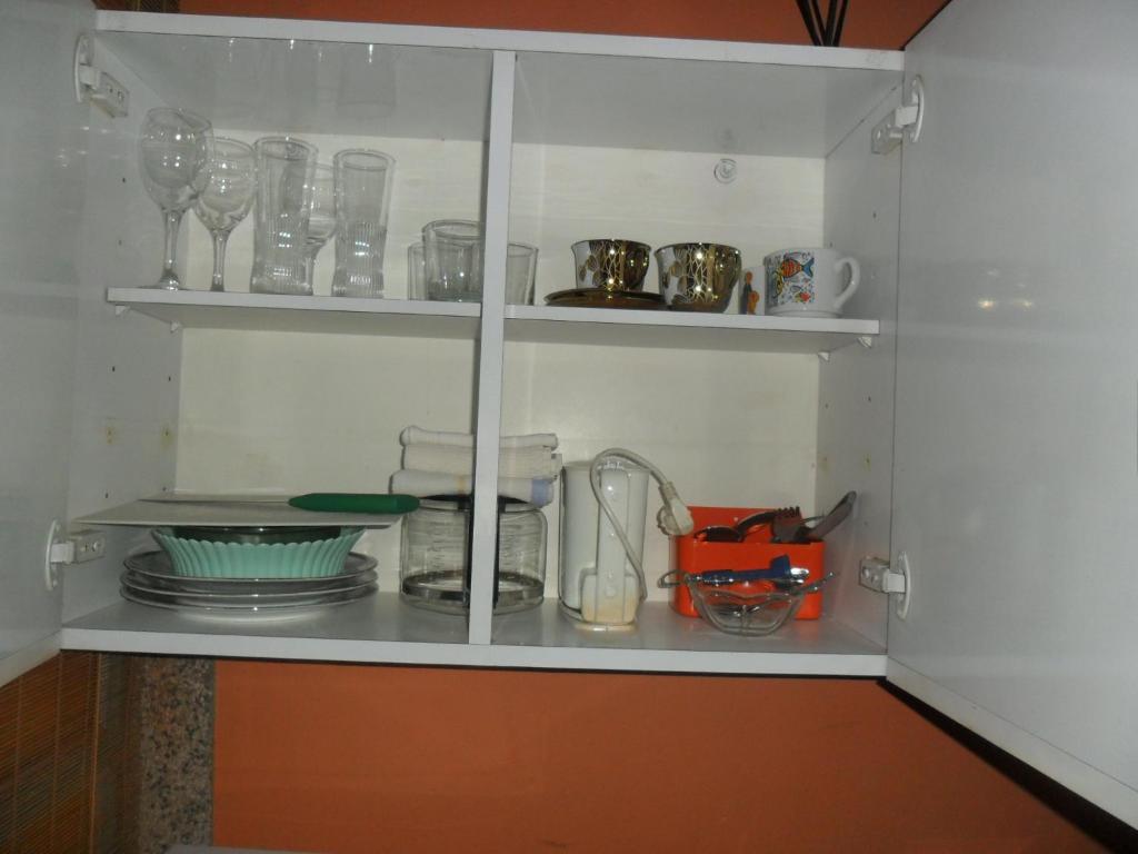 Kuchyň nebo kuchyňský kout v ubytování Apartmani Yucca