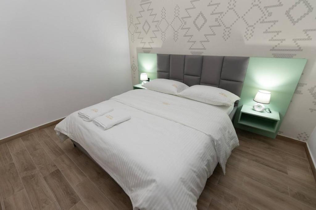 Postel nebo postele na pokoji v ubytování Sublime Bnb