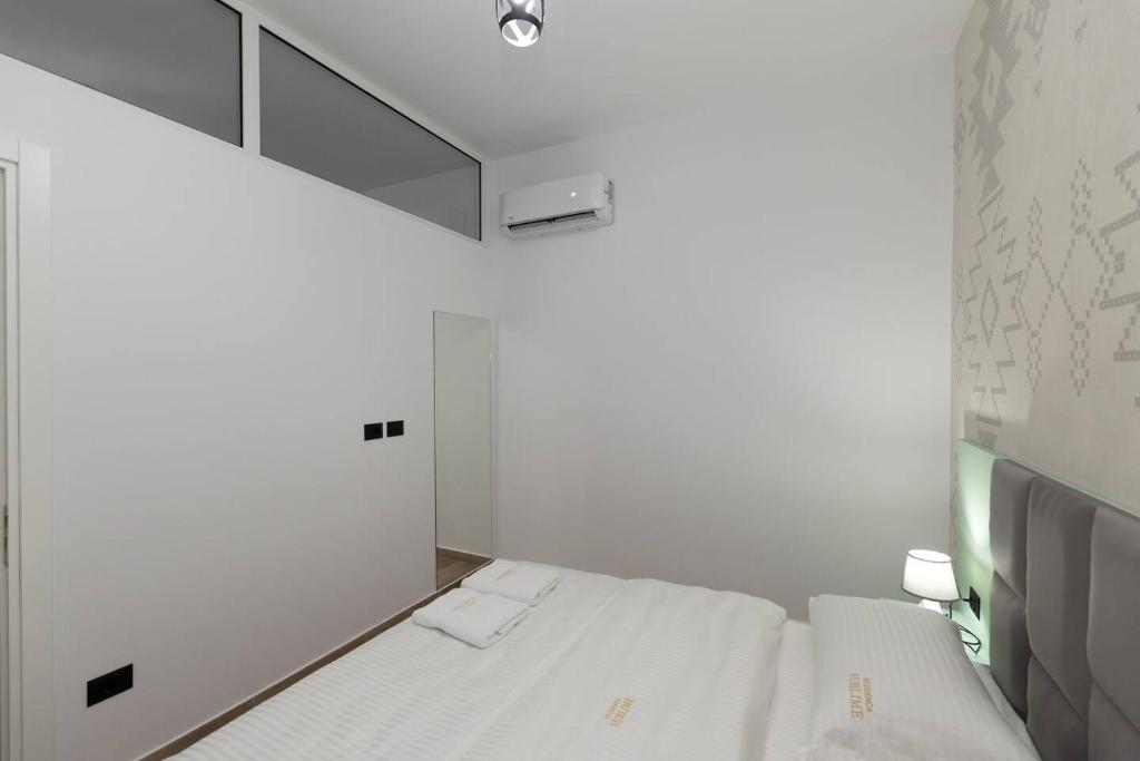 Postel nebo postele na pokoji v ubytování Sublime Bnb