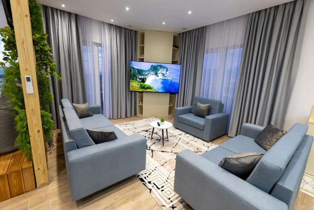 TV a/nebo společenská místnost v ubytování Sublime Bnb